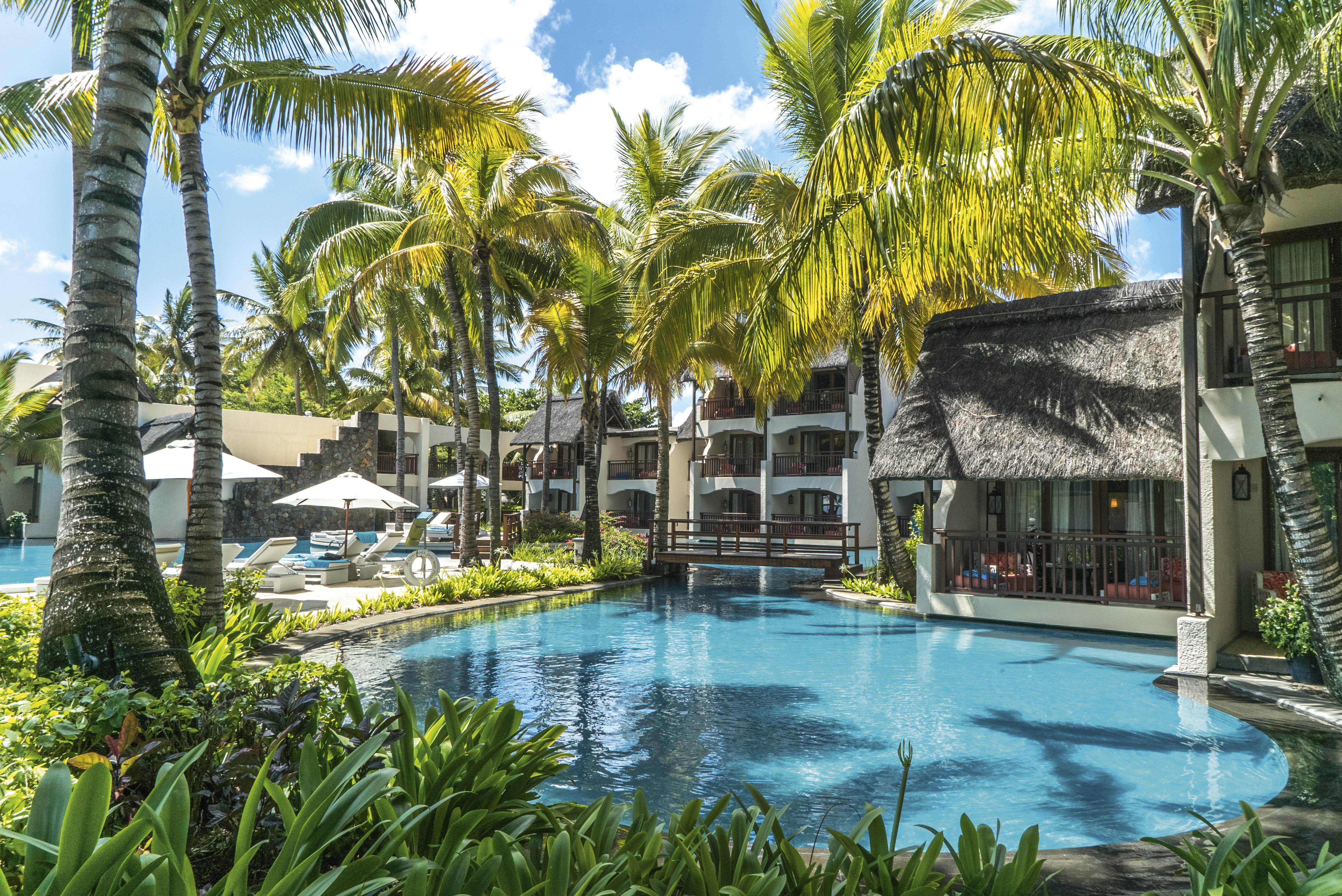 Constance Belle Mare Plage Esterno foto The swimming pool at the resort