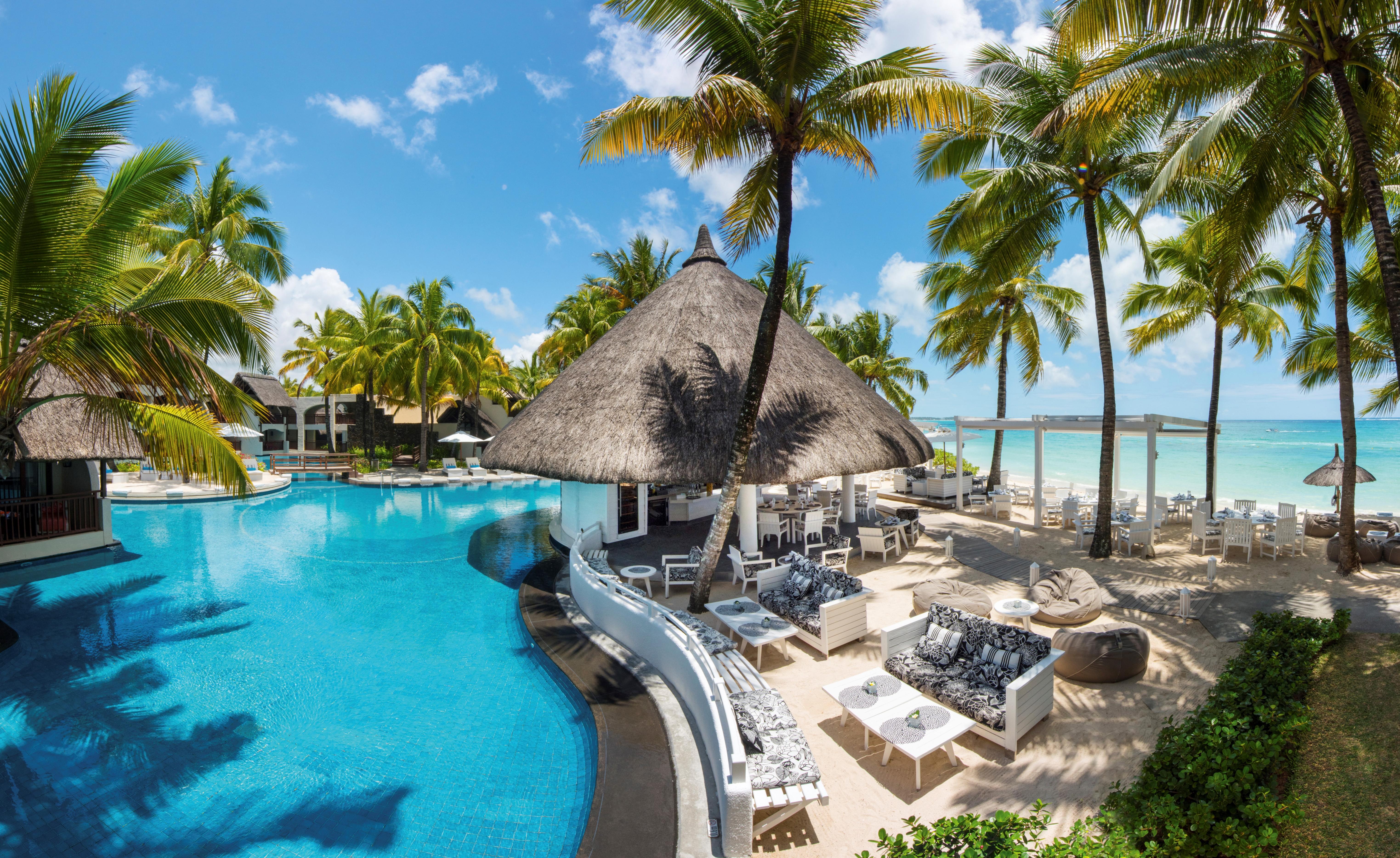 Constance Belle Mare Plage Esterno foto The swimming pool at the resort